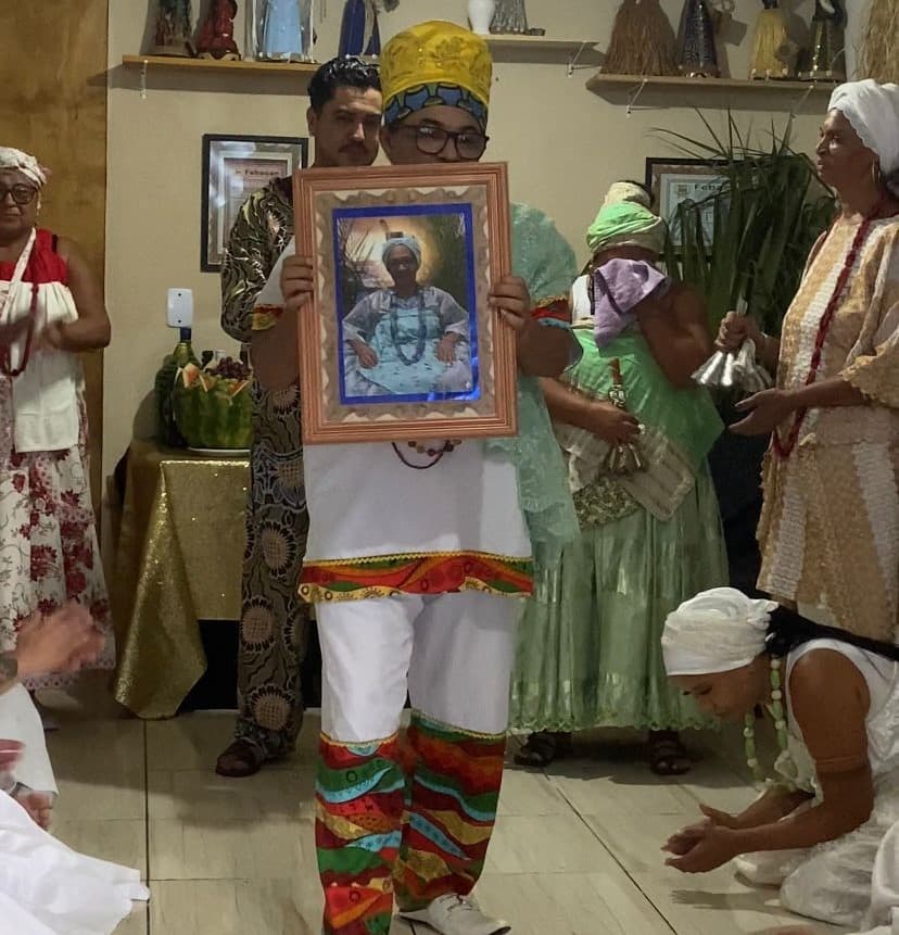 O AXÉ NÃO MORRE: LEGADO DE MÃE CÉLIA DE IEMANJÁ SE ERGUE EM FÉ E EMOÇÃO NA REABERTURA HISTÓRICA DO TU. OGUM DE RONDA